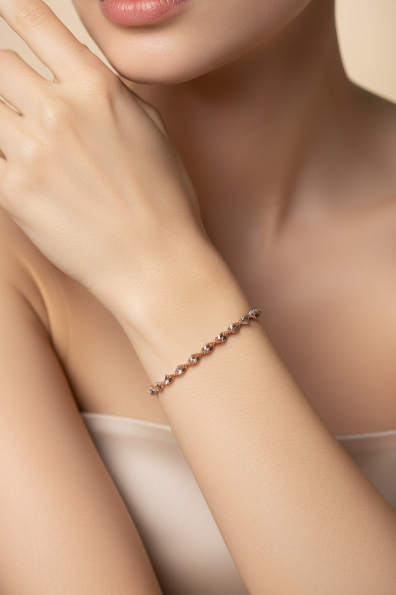 Positano – Rosévergoldetes Kettenarmband mit gedrehter Gliederstruktur